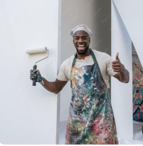 House painter smiling while holding a paint roller